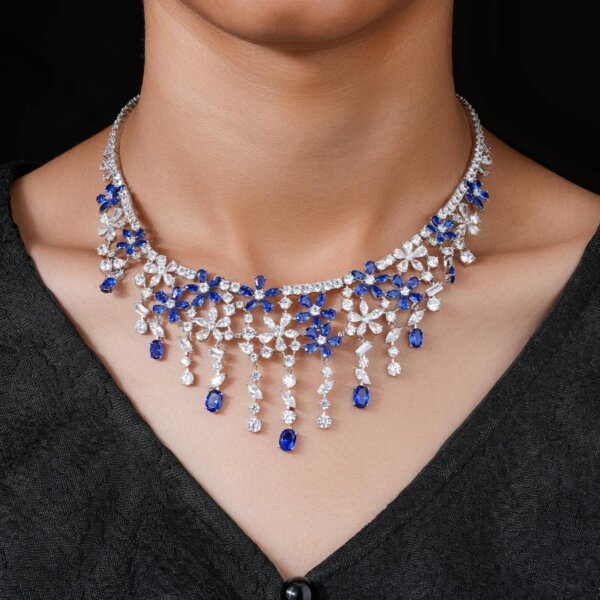 Close-up of a sapphire and diamond necklace on a model in Surat, India.